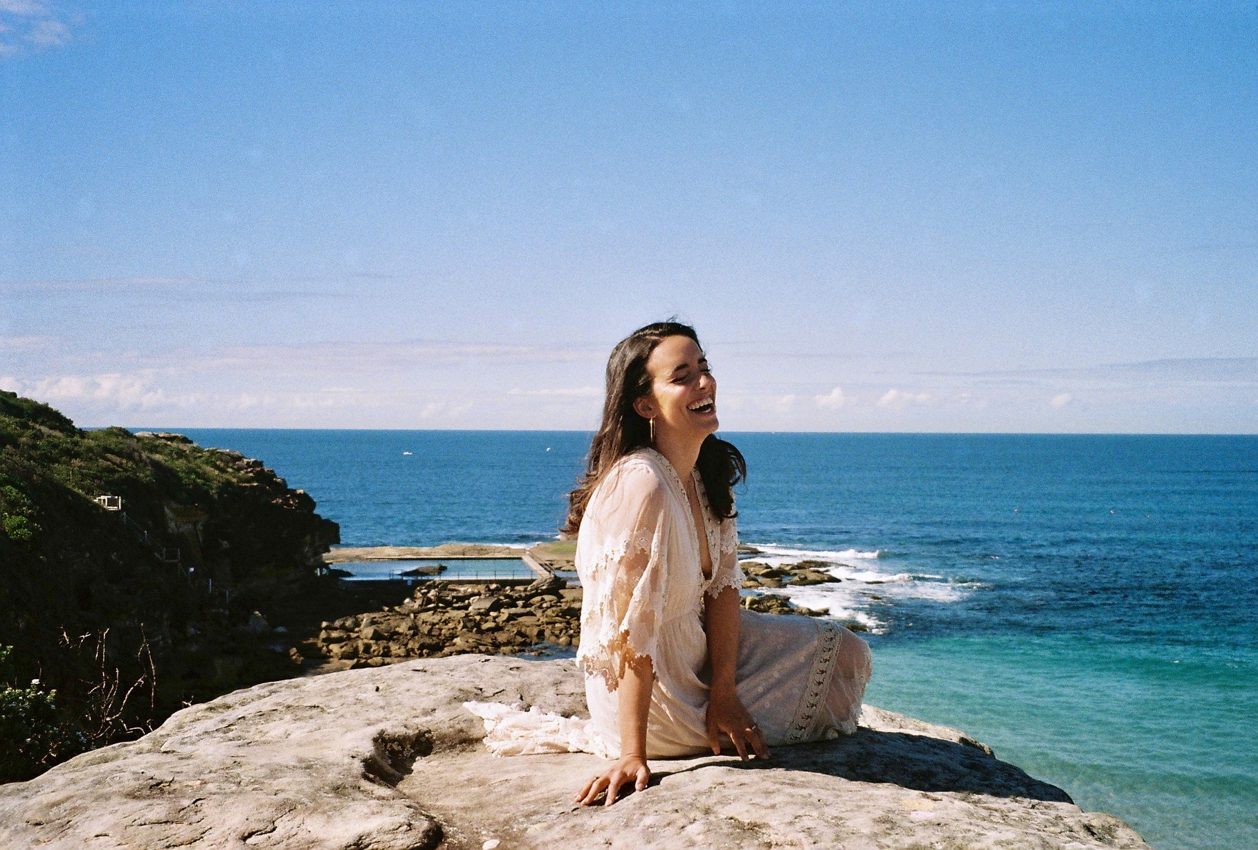 Olivia Maxwell by the ocean